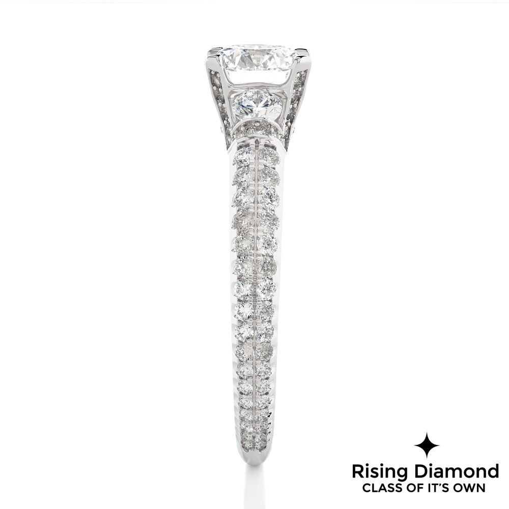1.31 Ct Round Cut Colorless Moissanite Three Stone Engagement Ring With Double Pave Shank